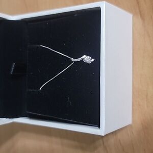 14K White Gold and .20ct Diamond Pendant on 18" chain.